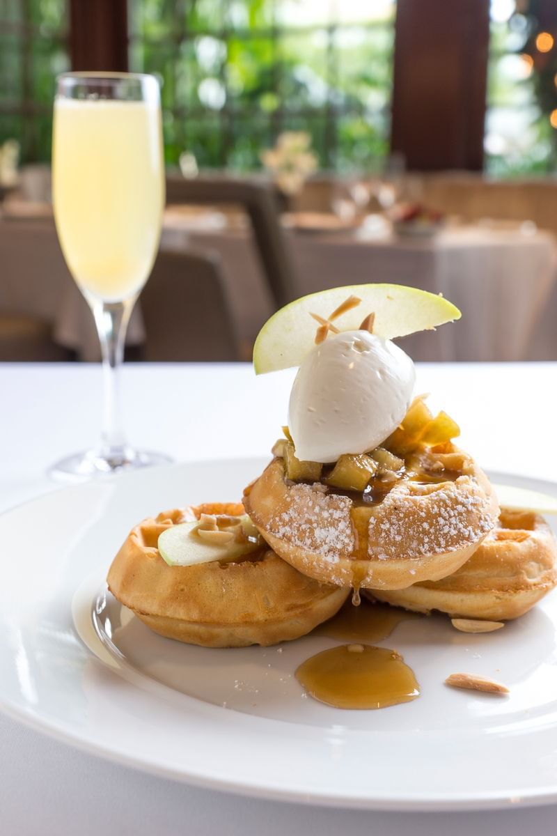 Sweet waffles dessert & fresh juice served at Brazilian Courtd