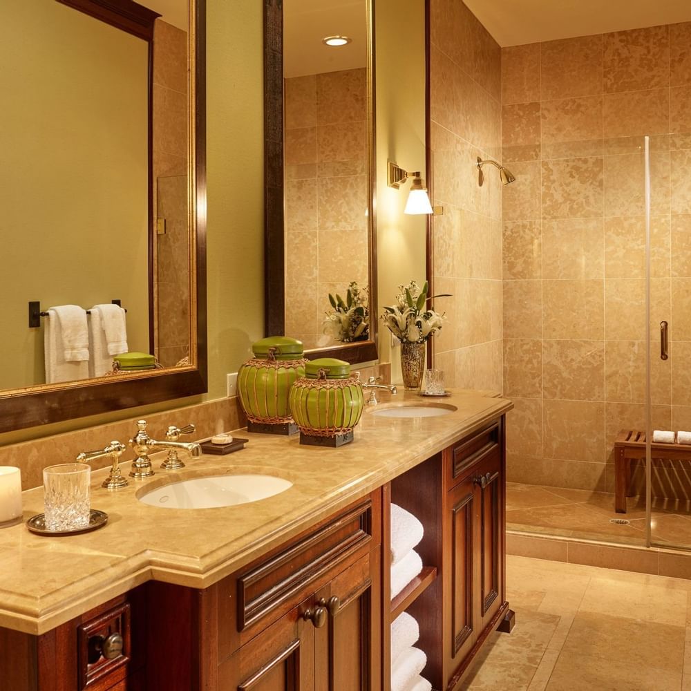 A couple having breakfast on bed at Brazilian Court